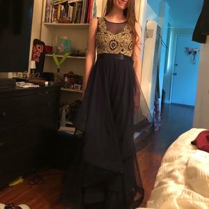 Floor length navy blue with gold accent gown. Only worn once! Fun flowy bottom